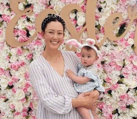 Michelle Wie with her daughter Makenna Kamalei Yoona West.